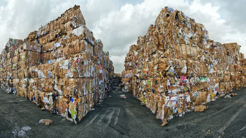Professional waste clearance team managing construction debris